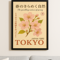 Framed poster with cherry blossoms and text on a beige background