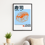 Framed poster of sushi with Japanese text on a wall above a sofa and plant.