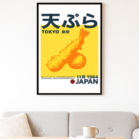 Framed poster with a stylized illustration of a fried food item on a yellow background, featuring text in Japanese and English.